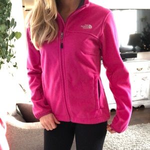 The north face pink zip up sweater